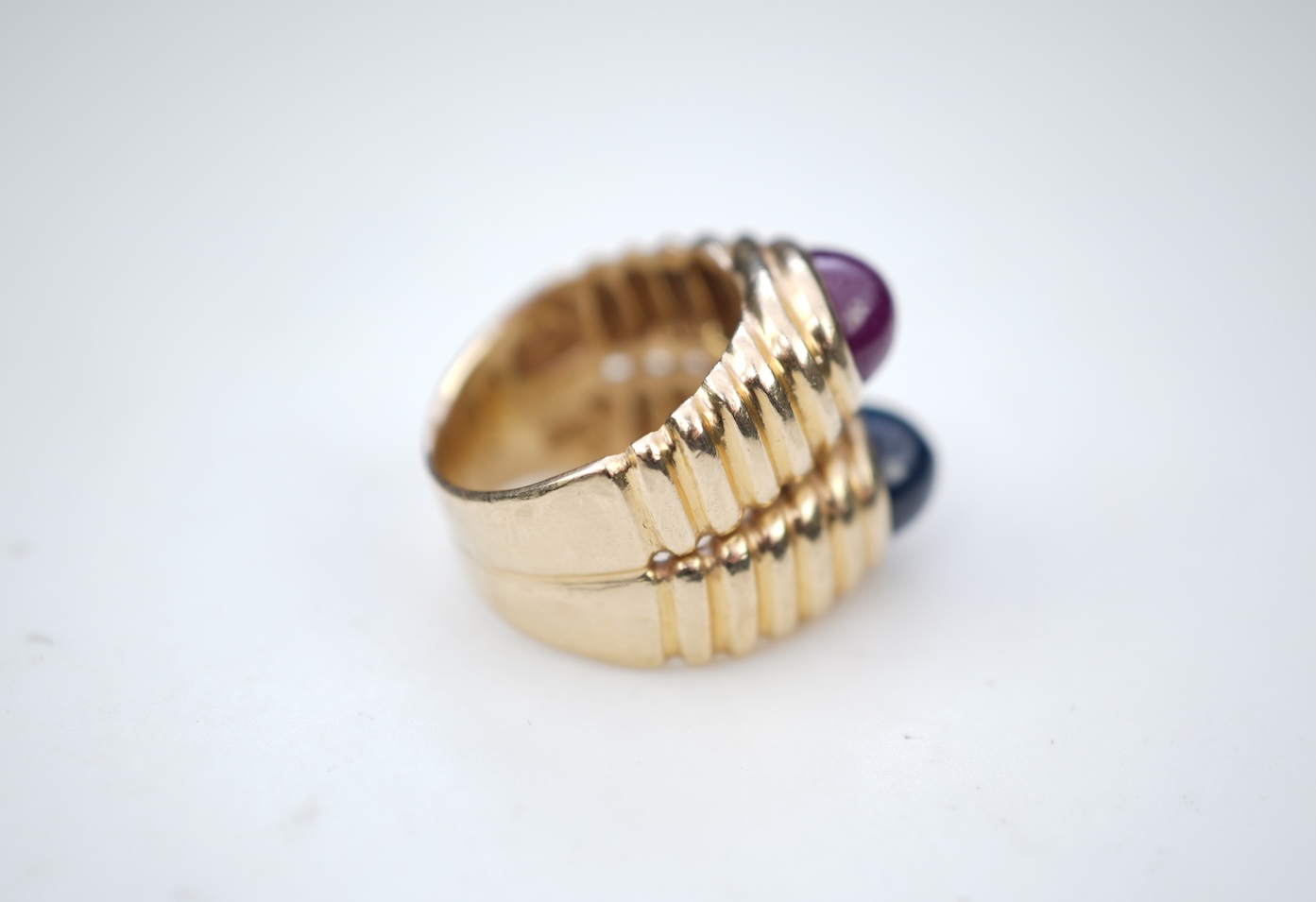 A sapphire and ruby ring